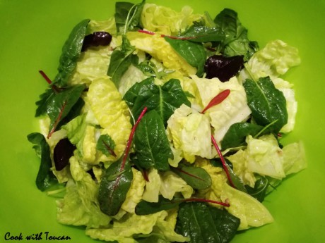 Salad mix with olive oil, lemon juice and chopped anchovy