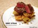 Beef steak with roasted potatoes and pickled green peppercorns